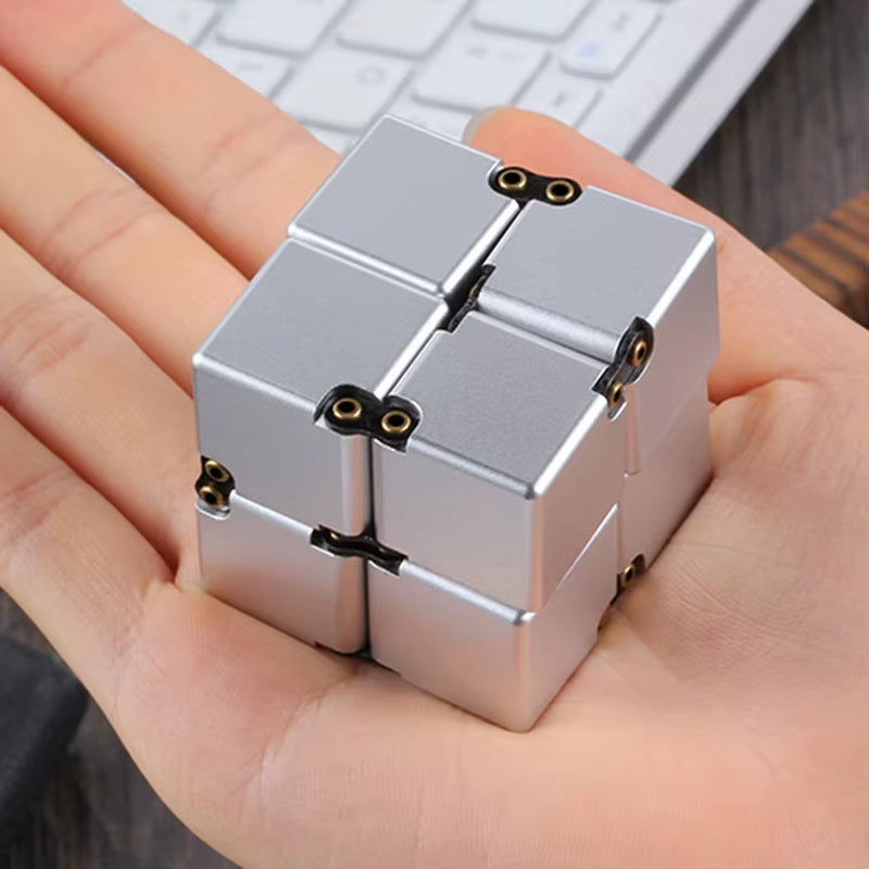Experience Calm with the Infinity Cube Metal Fidget Toy - The Ultimate Anxiety Relief Device for Adults and Kids with Autism and ADHD
