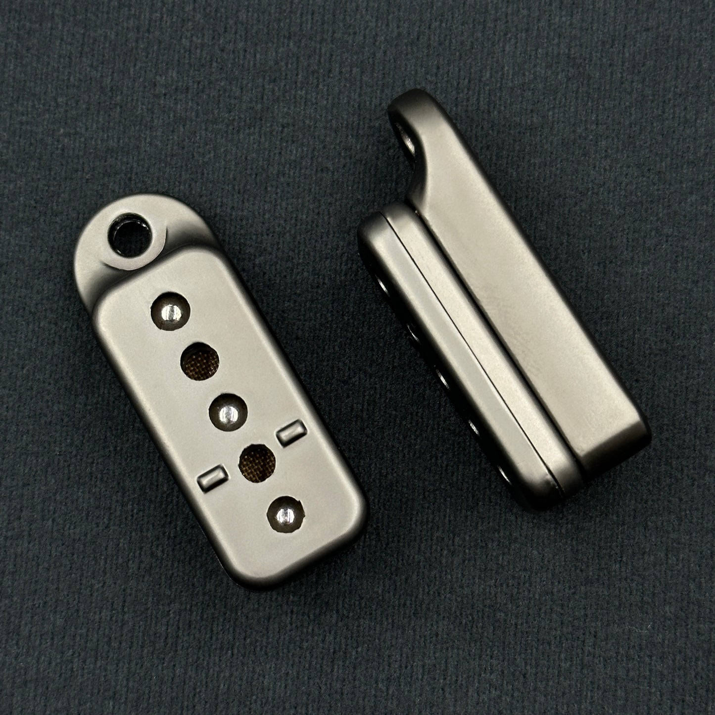 Metal fidget slider with magnetic push mechanism and tactile click feedback, designed for stress relief, focus support, and satisfying one-handed play, suitable as an everyday carry desk toy or keychain accessory.