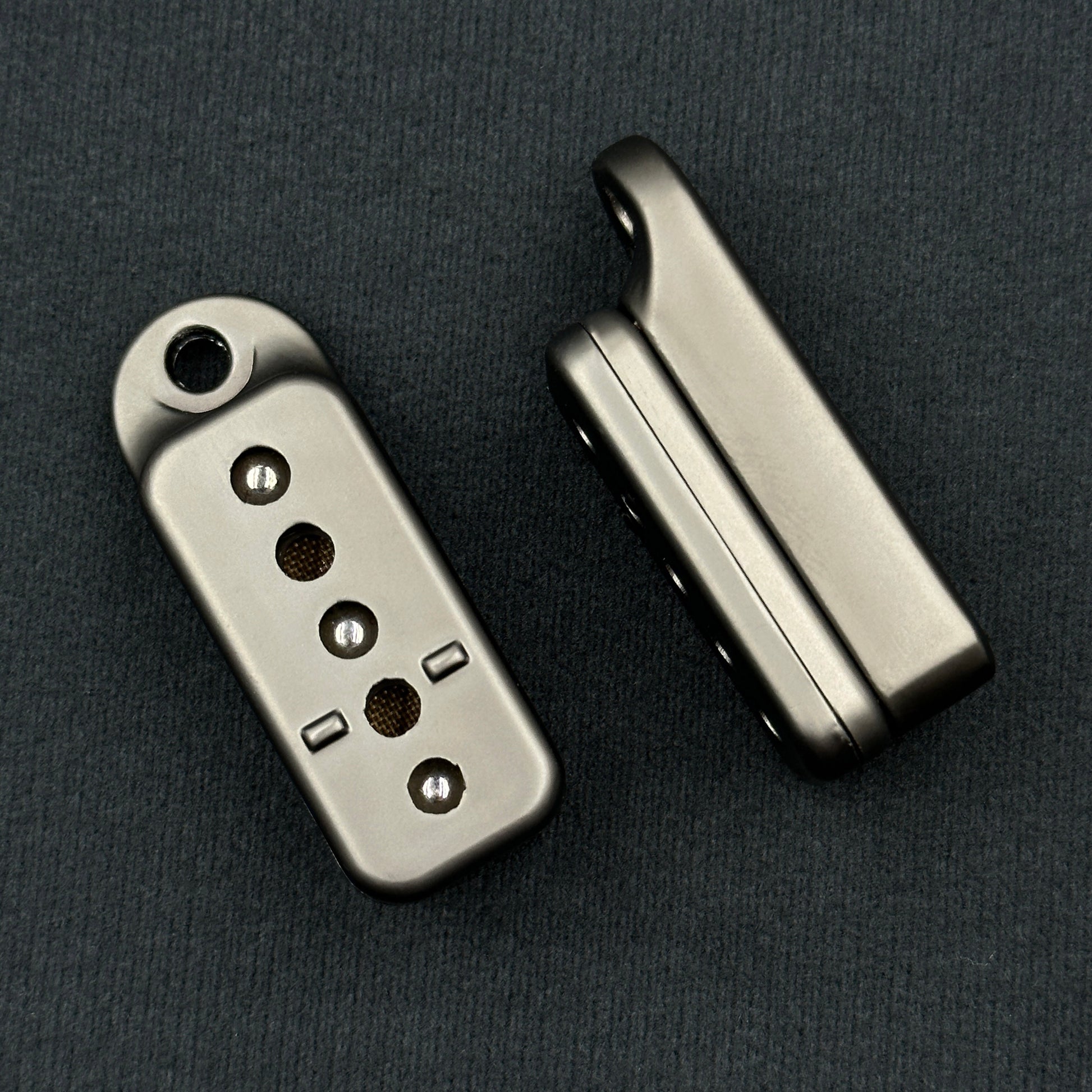 Metal fidget slider with magnetic push mechanism and tactile click feedback, designed for stress relief, focus support, and satisfying one-handed play, suitable as an everyday carry desk toy or keychain accessory.