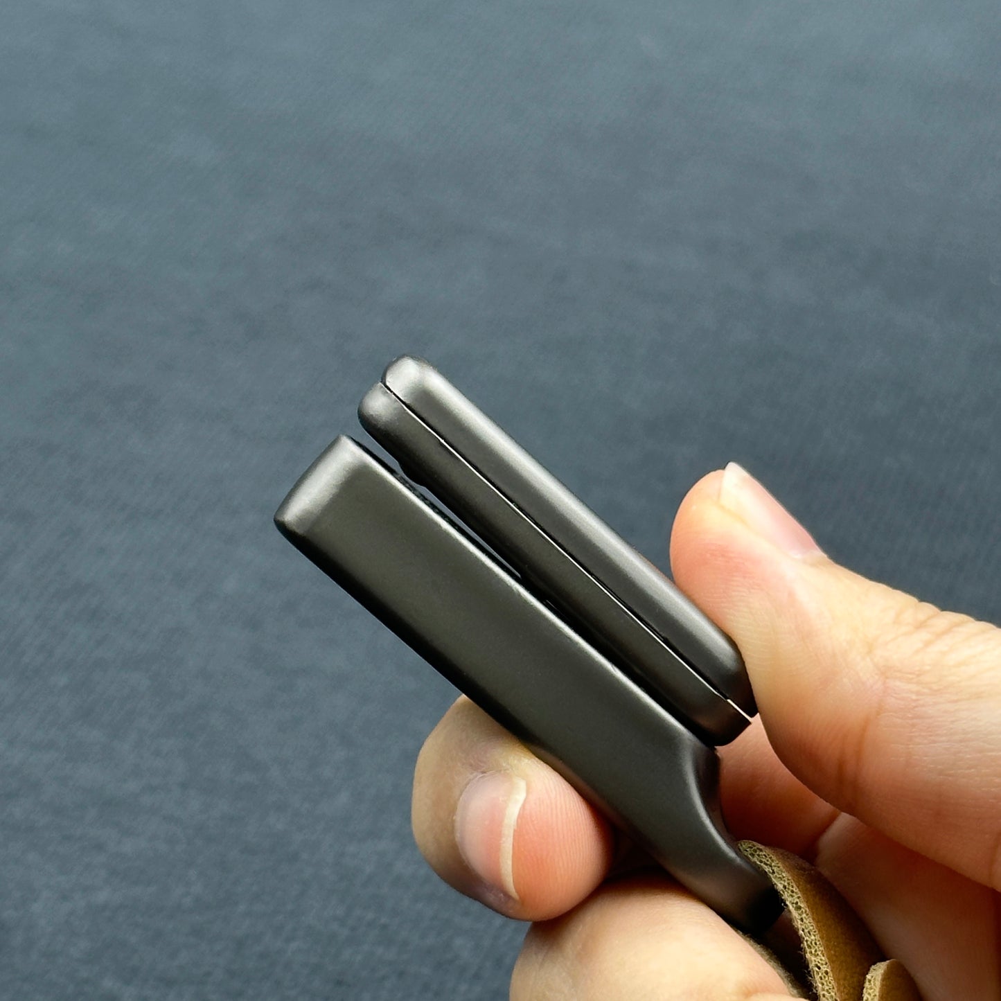 Metal fidget slider with magnetic push mechanism and tactile click feedback, designed for stress relief, focus support, and satisfying one-handed play, suitable as an everyday carry desk toy or keychain accessory.