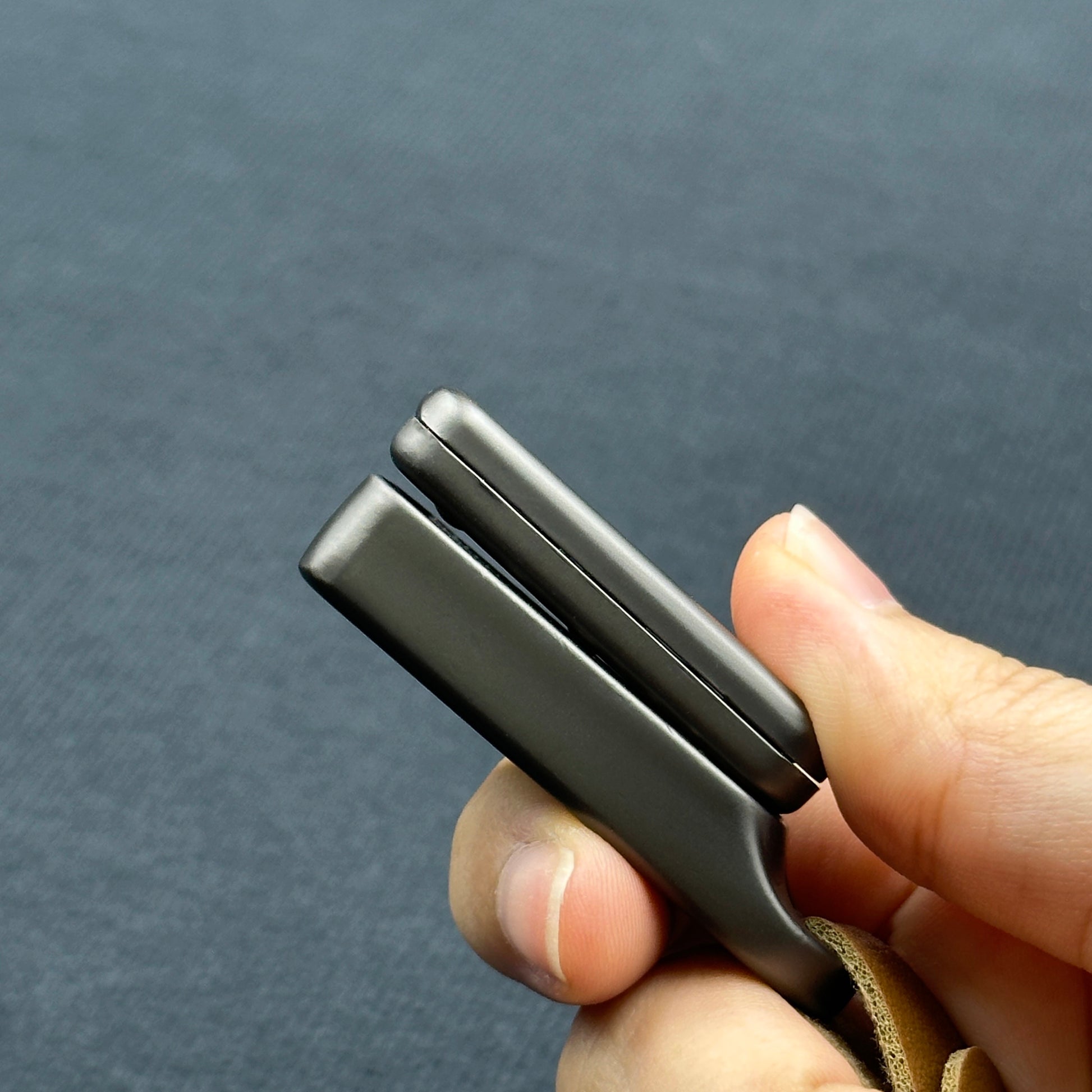 Metal fidget slider with magnetic push mechanism and tactile click feedback, designed for stress relief, focus support, and satisfying one-handed play, suitable as an everyday carry desk toy or keychain accessory.