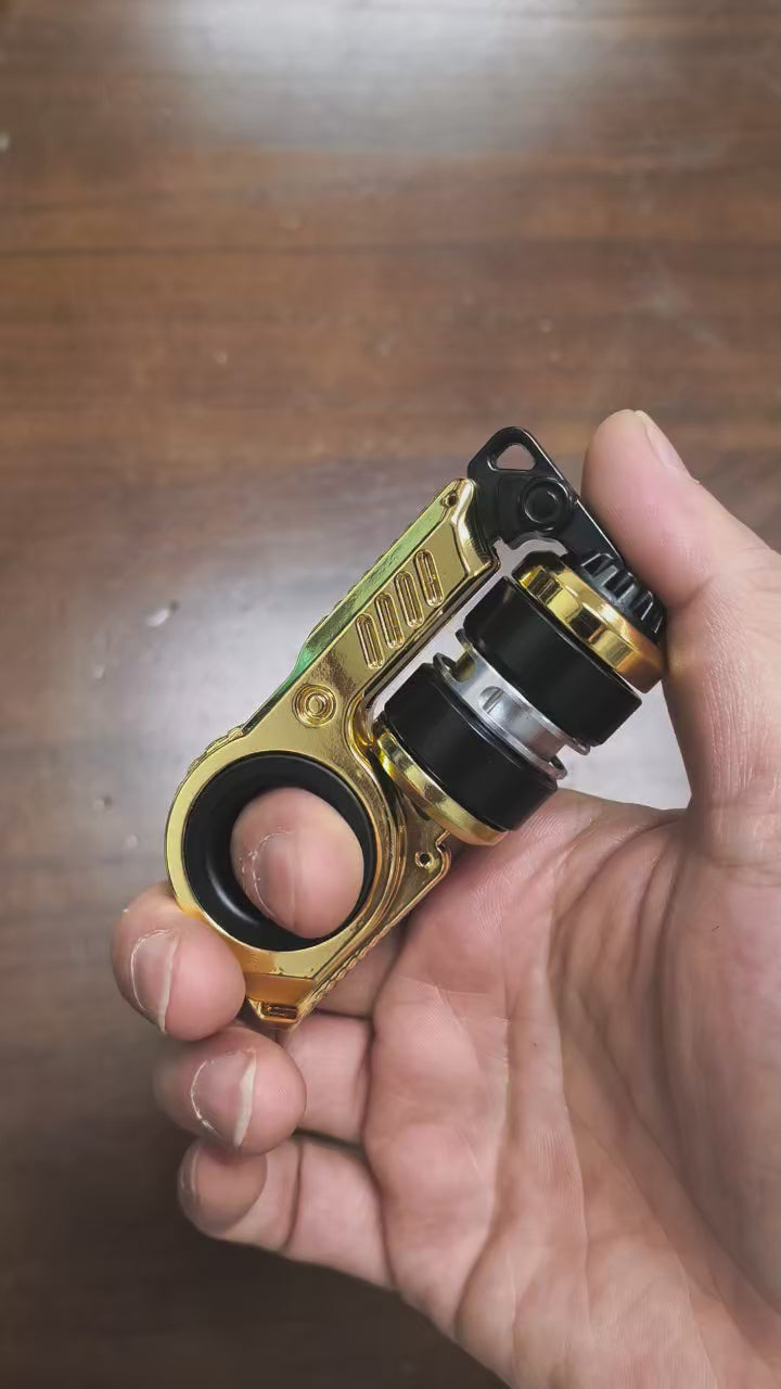 Mechanical EDC fidget slider object with ratchet mechanism and ring grip, metallic body with precision details, handheld scale, designed for tactile focus and stress relief