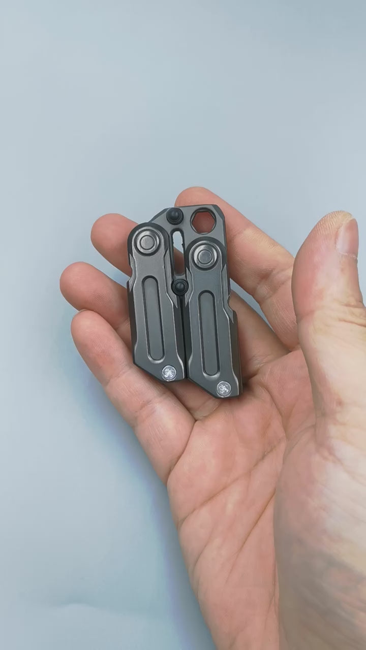 Butterfly knive-style magnetic EDC fidget tool with balisong-inspired flip mechanism, designed for smooth one-handed movement, focus, and stress relief in everyday situations